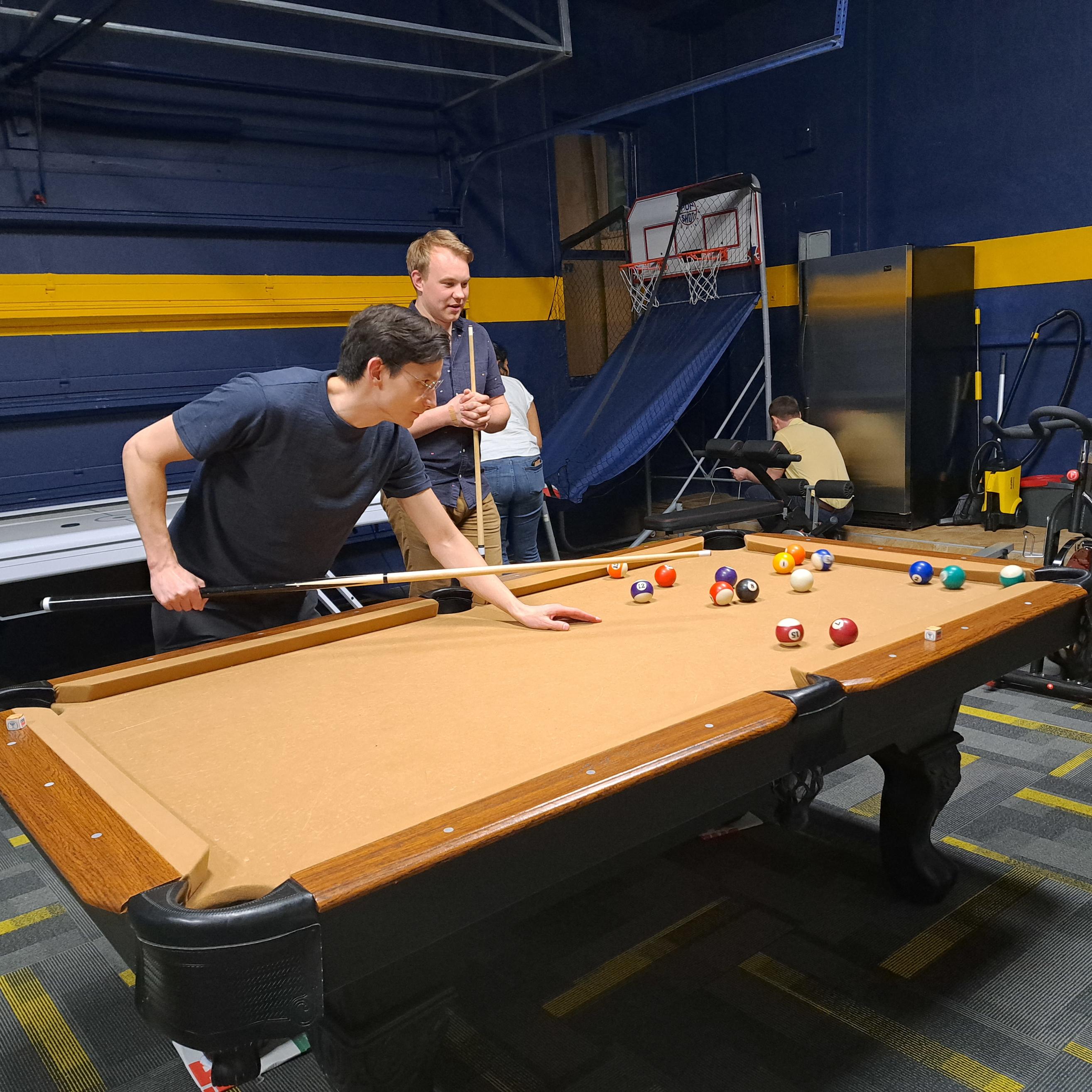 Allen and Antuan playing pool