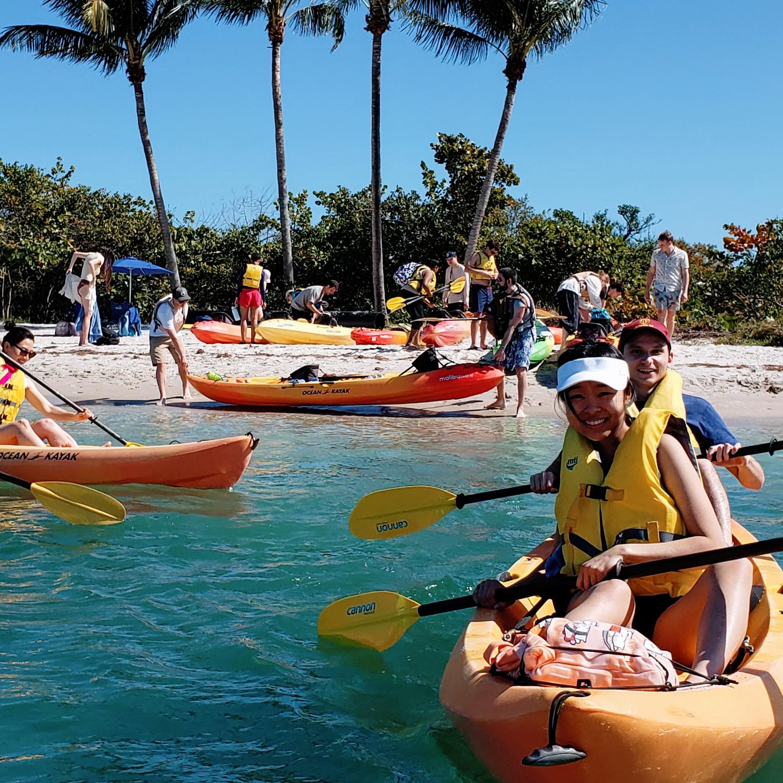 the group takes off from Peanut Island in kayaks