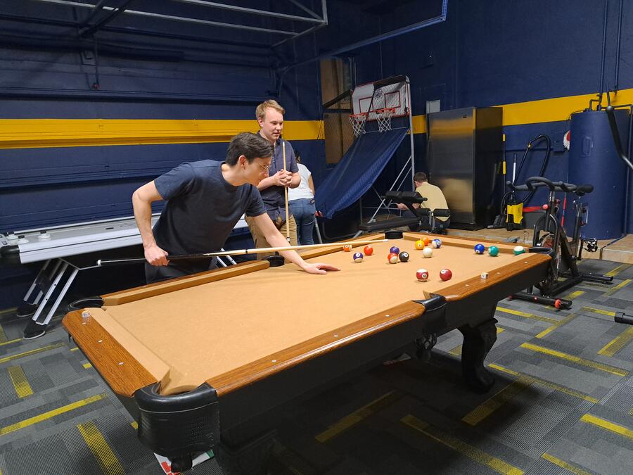 Allen and Antuan playing pool